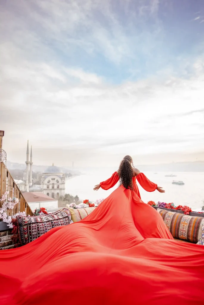 As the day draws to a close and the stars begin to twinkle overhead, the couple takes a moment to savor the beauty of the Bosphorus below, their hearts full of love and gratitude for the unforgettable experience they've shared together. With each photograph serving as a cherished memory of their time in Istanbul, the couple bids farewell to the rooftop, their love story forever captured in the timeless beauty of the flying dress and the enchanting backdrop of the Bosphorus.